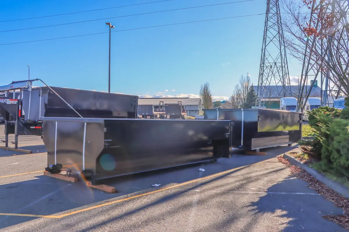 Roll-off dumpster ready for waste disposal at job site for 2 Yard Dumpster Rental in South Apopka